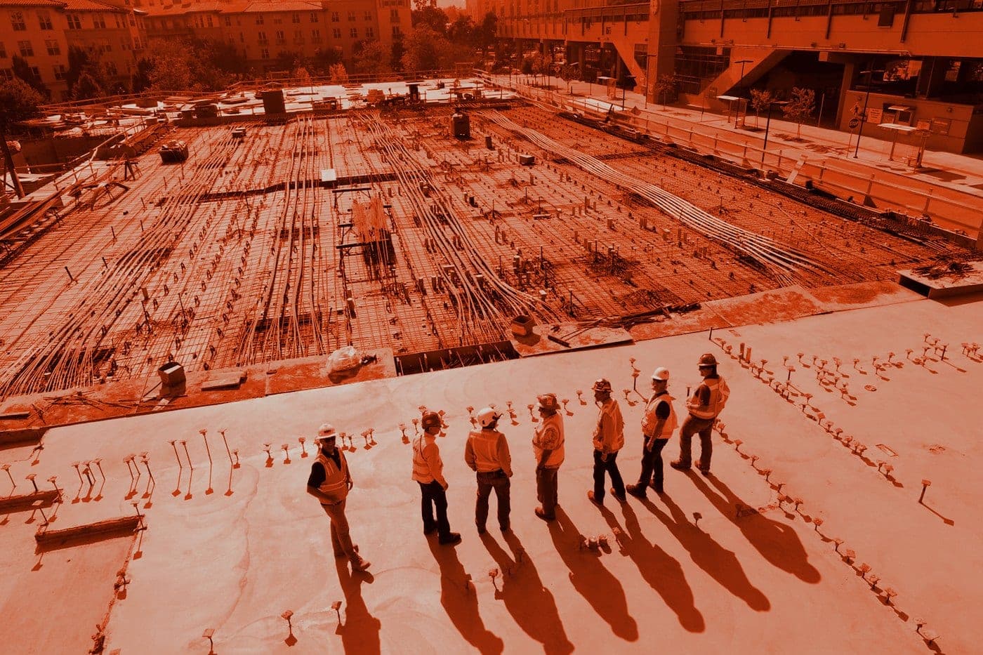 A live concrete deck prepared for masonry — no identifiable faces.